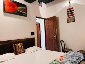 Postel nebo postele na pokoji v ubytování Nomads House