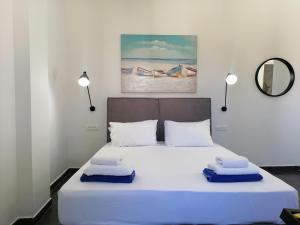 Postel nebo postele na pokoji v ubytování Villa Mare by Delfinia Resort