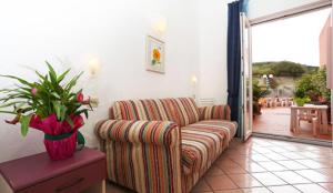 Uma área de estar em Hotel Residence S.Angelo