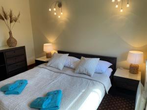 Łóżko lub łóżka w pokoju w obiekcie Apartament Krynica Morska Continental
