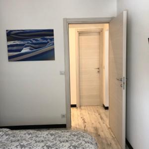 A bed or beds in a room at La Casa di Gio Golf Tennis e parcheggio privato