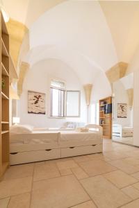 Posteľ alebo postele v izbe v ubytovaní Milestone Inn Lecce