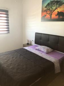 Posteľ alebo postele v izbe v ubytovaní Casa Niky 25
