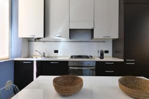 Kuchyňa alebo kuchynka v ubytovaní Charming 5 Vie Apt. Milan Center