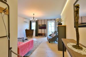 TV in/ali zabaviščno središče v nastanitvi Residenz Styrian Toskana Splendid