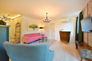 TV in/ali zabaviščno središče v nastanitvi Residenz Styrian Toskana Splendid
