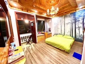 Postel nebo postele na pokoji v ubytování Nấm Home