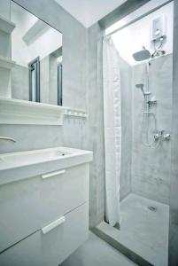 A bathroom at The old Tailor Factory White Room