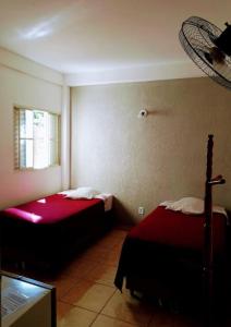 Krevet ili kreveti u jedinici u objektu Hotel Iguaçu