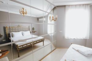 Postel nebo postele na pokoji v ubytování Muup Alaçatı