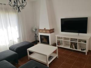 Telewizja i/lub zestaw kina domowego w obiekcie Casa Alma