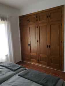 Łóżko lub łóżka w pokoju w obiekcie Casa Alma