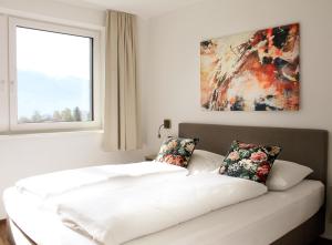 Letto o letti in una camera di TheView Ahorn