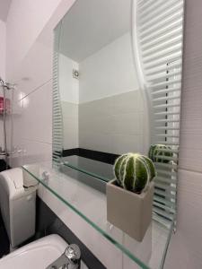 Ένα μπάνιο στο Rent rooms Loren
