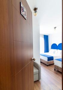 Cama o camas de una habitación en Hotel Vera