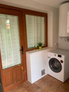 Fotografie z fotogalerie ubytování Apartamento con jardín privado y acceso a piscina v destinaci Huelva