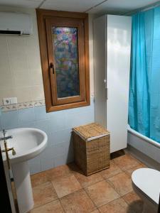 Koupelna v ubytování Apartamento con jardín privado y acceso a piscina + 20 fotografií