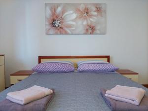 Llit o llits en una habitació de Apartment Buga