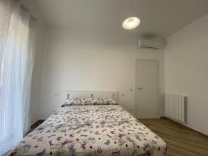 Posteľ alebo postele v izbe v ubytovaní La casa di Elia e Italo