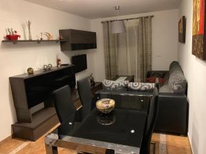 Kuchyň nebo kuchyňský kout v ubytování Apartamento con jardín privado y acceso a piscina