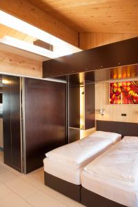 Ένα ή περισσότερα κρεβάτια σε δωμάτιο στο Kar Design Appartements