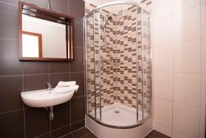 Kúpeľňa v ubytovaní Apartmany Sileas