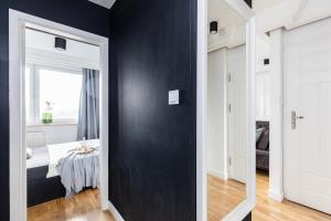 Posteľ alebo postele v izbe v ubytovaní SuperApart Polna 30