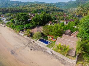 an aerial view of a small village with a road at Krisna Bungalows and Restaurant in Sekotong