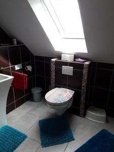 Phòng tắm tại Fewo Haus Morgenstern im Ankerweg