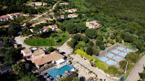 an aerial view of a house with a swimming pool at Résidence U Pirellu in Porto-Vecchio