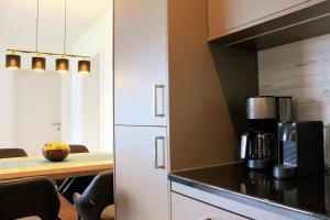 A kitchen or kitchenette at TheView Garden