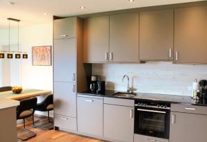 A kitchen or kitchenette at TheView Garden