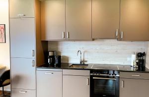 A kitchen or kitchenette at TheView Garden