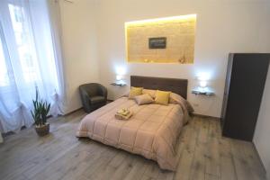Postel nebo postele na pokoji v ubytování Corte Gattini Rooms