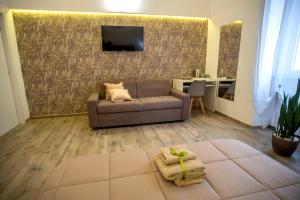Posezení v ubytování Corte Gattini Rooms