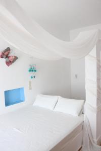 A bed or beds in a room at Niriedes Villas