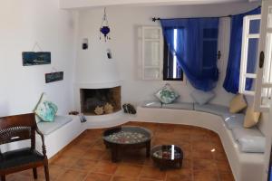 A seating area at Niriedes Villas