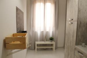 TV a/nebo společenská místnost v ubytování Appartamento Vittoria