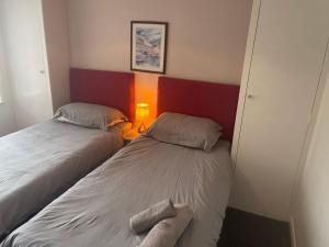 Un pat sau paturi într-o cameră la 11 Chester road Newquay