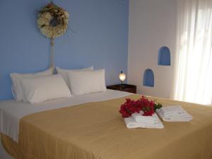 מיטה או מיטות בחדר ב-Niriedes Villas