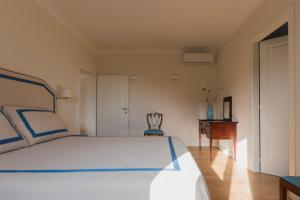 Posteľ alebo postele v izbe v ubytovaní Villa di Campagna Santa Giulia