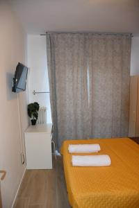 Postel nebo postele na pokoji v ubytování Venice Stay