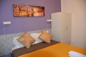 Postel nebo postele na pokoji v ubytování Venice Stay
