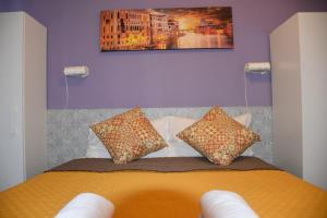 Postel nebo postele na pokoji v ubytování Venice Stay