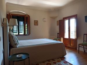Posteľ alebo postele v izbe v ubytovaní Villa di Campagna Santa Giulia