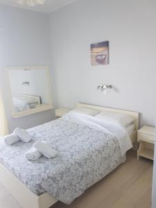 Ένα ή περισσότερα κρεβάτια σε δωμάτιο στο Paradise Apartments Barbati