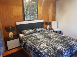 a bedroom with a large bed and two night stands at Casa do Adro in Viana do Castelo +36 photos