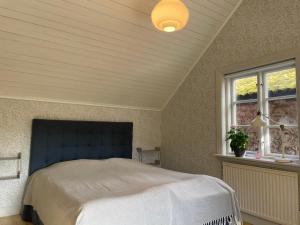 Postel nebo postele na pokoji v ubytování Ölandsgården