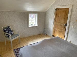 Postel nebo postele na pokoji v ubytování Ölandsgården