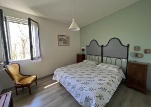 Llit o llits en una habitació de B&B Agriturismo Casa Vallona